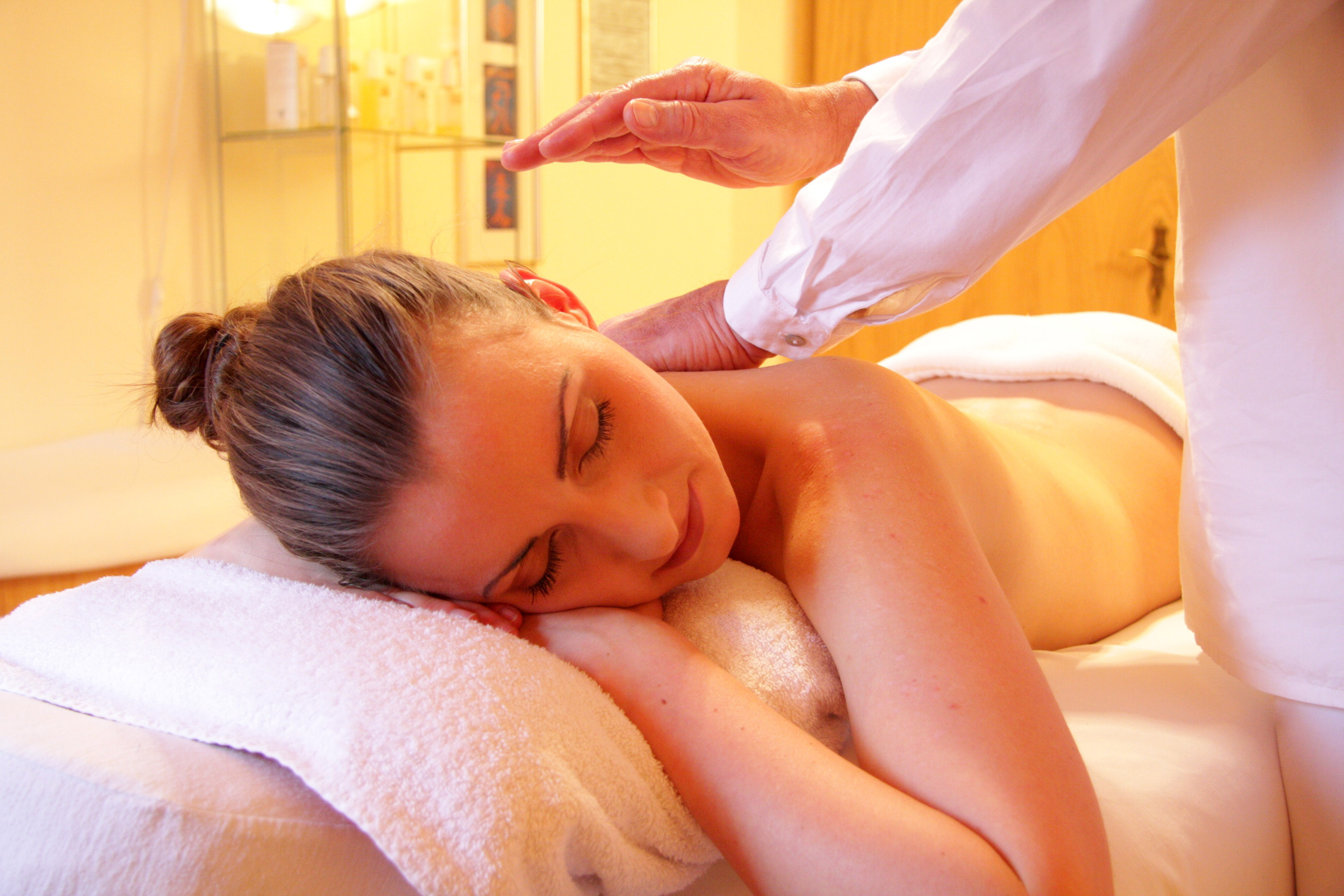 Woman Receiving Back Massage Stock Photo, Royalty-Free