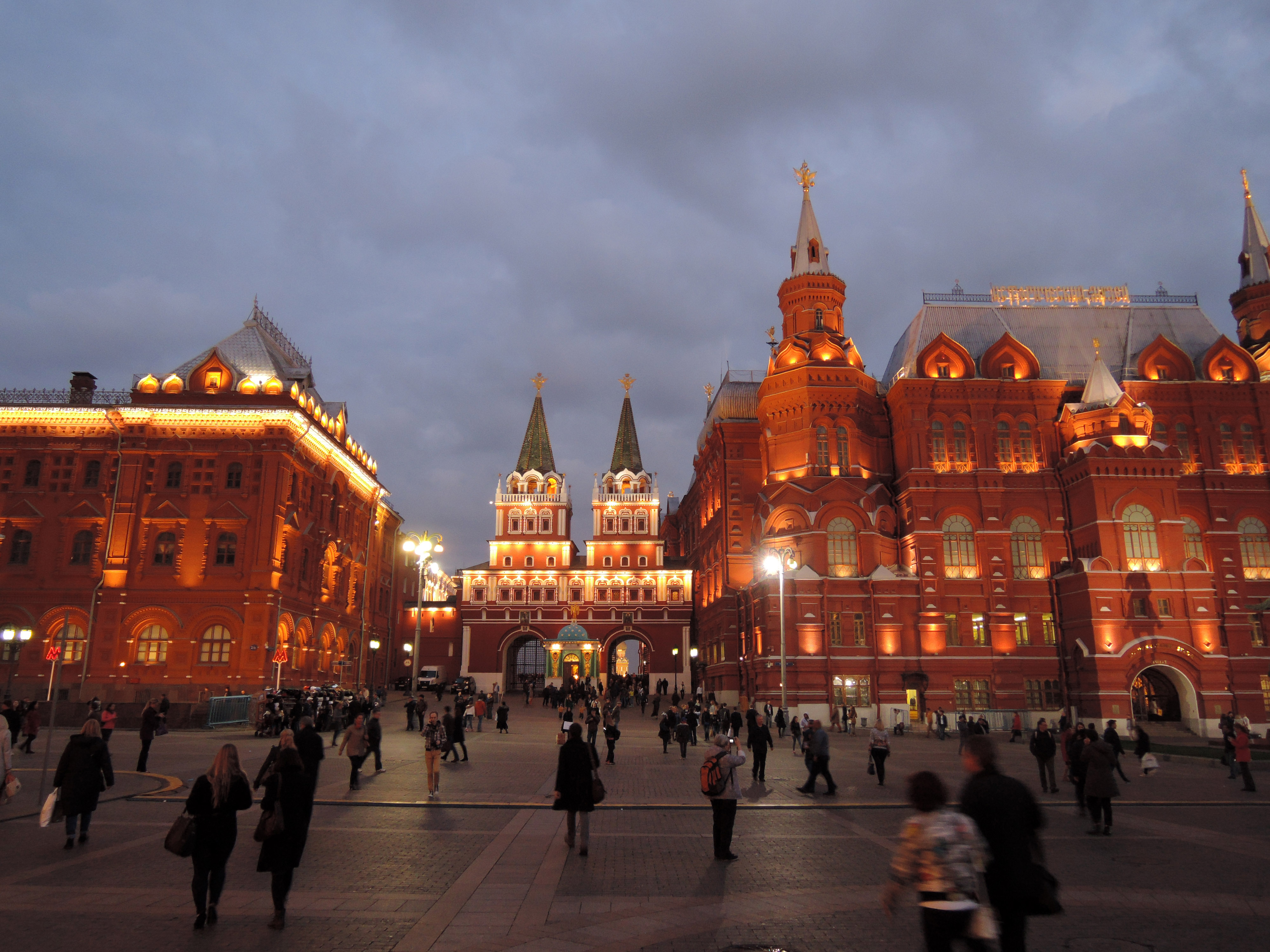 People walking around the square at night in Moscow, Russia image ...