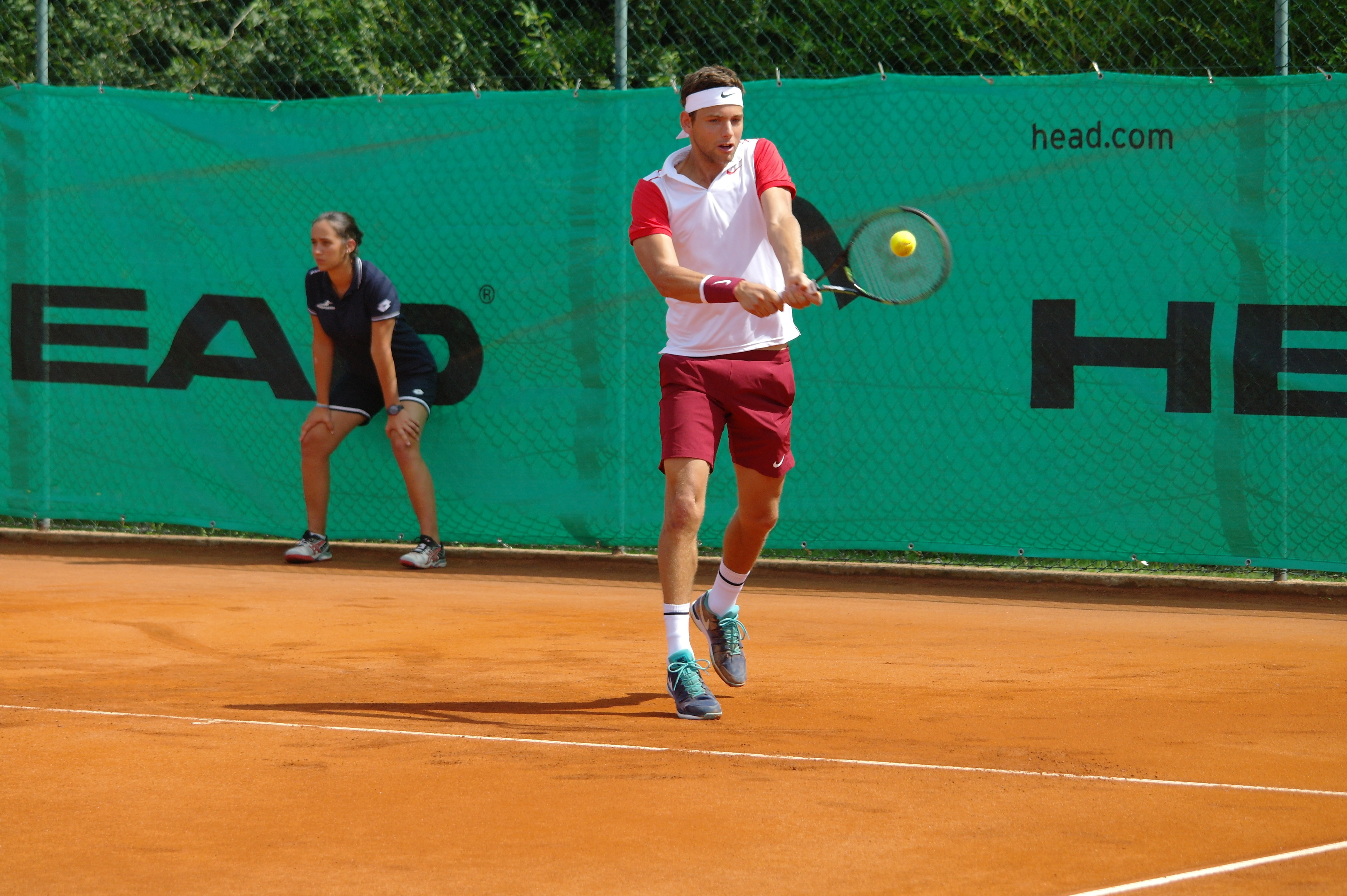 Man Hitting a Volley Shot in Tennis  image Free stock 