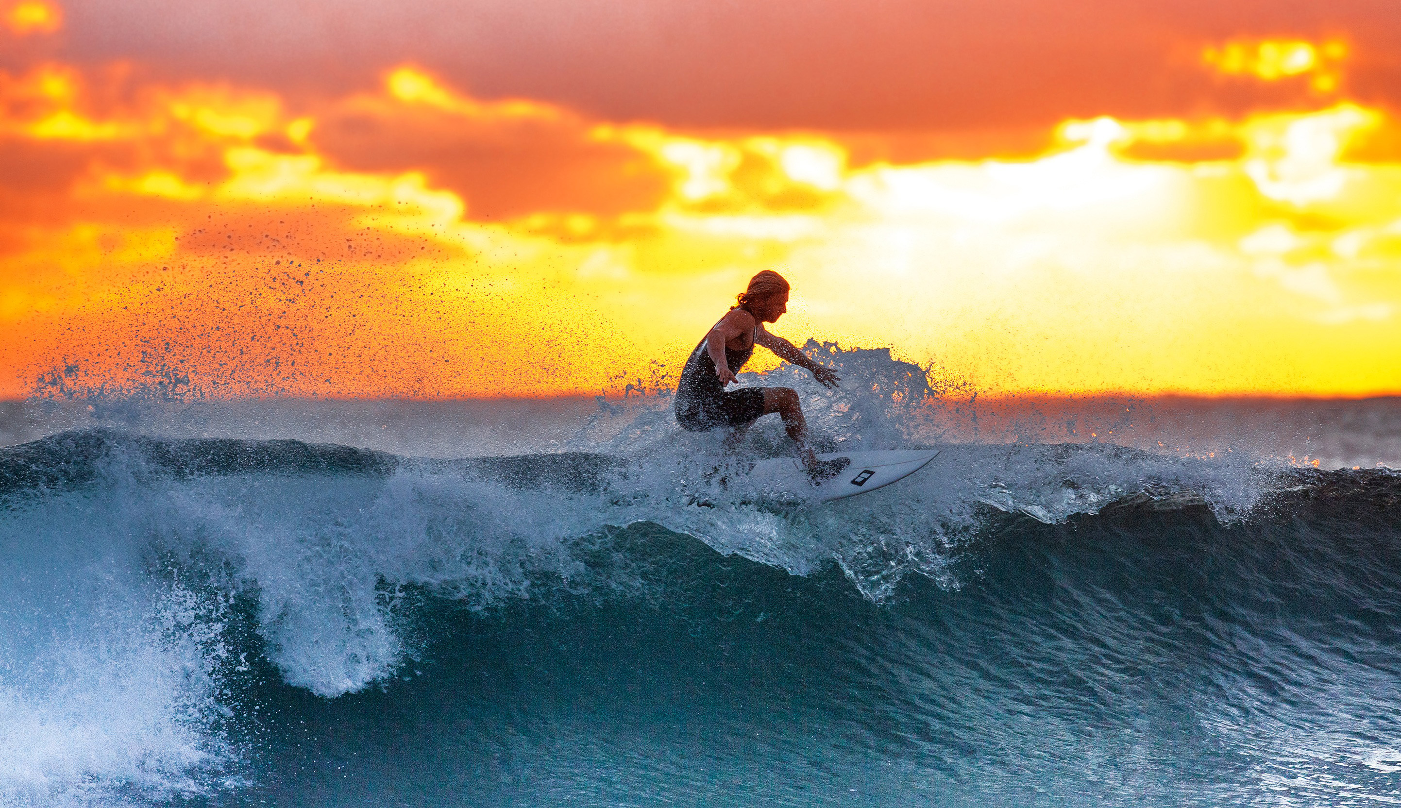 Man surfing a wave at sunset image - Free stock photo ...