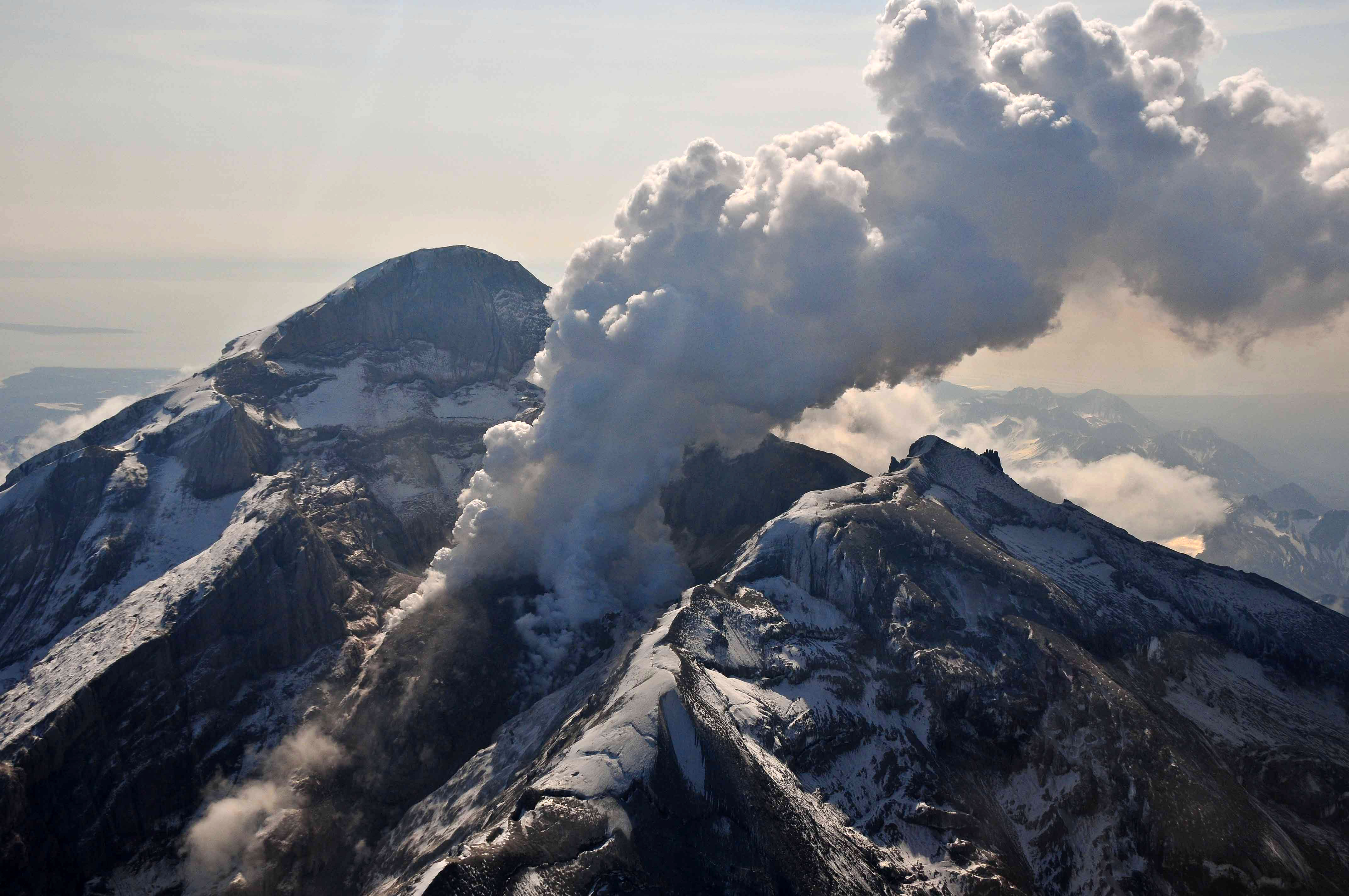 Crater with steam of redoubt Volcano  in Lake  Clark 