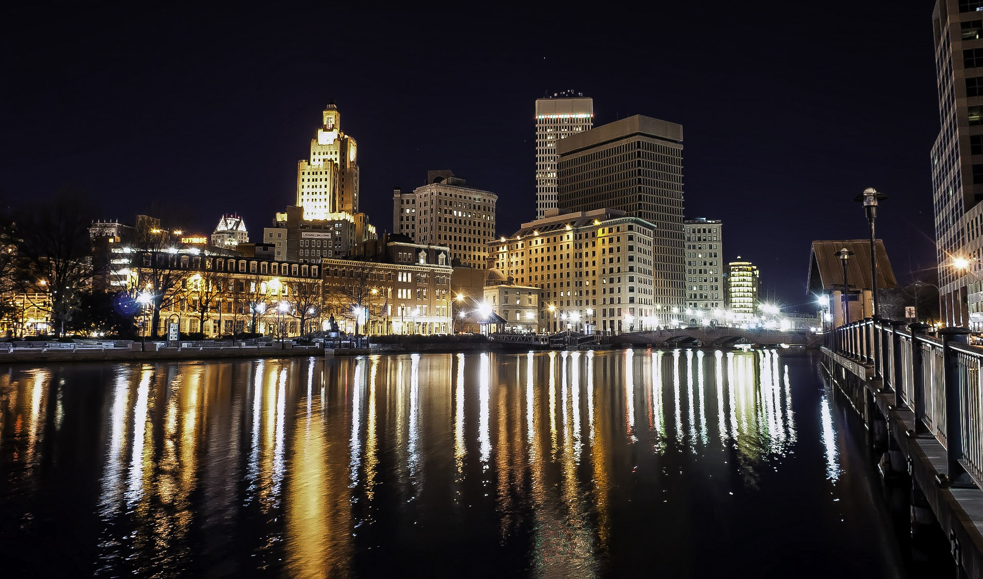 Skyline of Providence, Rhode Island at nighttime over the water image