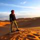 Man Standing on a sand dune in Algeria