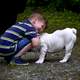 Kid playing with Dog