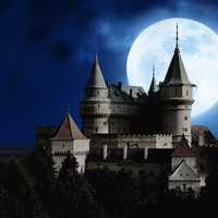 Moon behind th castle