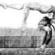 Young Female Gymnast on Balance Beam