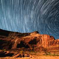 Star trails over the rocky landscape