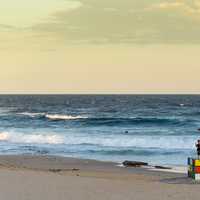 Kids standing on Rubik cube at maroubra beach, Australia