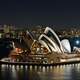 Night Time Opera House with city skyline in Sydney, New South Wales, Australia