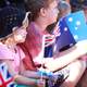 Children wave Australian Flags during Parade in Darwin, Australia