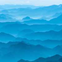 Mountain Silhouettes in the Mist in the Brandenburg Alps, Austria