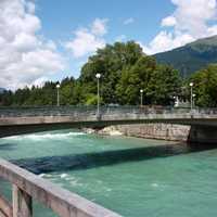 Pfarrbrücke bridge with river running below it in Leinz, Austria