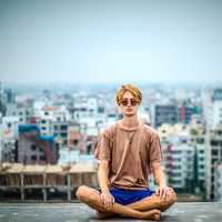 Person sitting in front of the Dhaka, Bangladesh