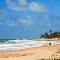 Couple on the Beach in Brazil under blue sky