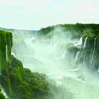 Misty scenic photo of Iguazu Falls, Brazil