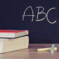 Books and Chalkboard with ABC