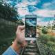 Cellphone Selfie of railroad and sky