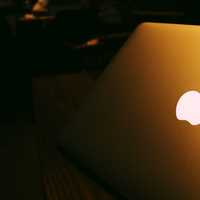 Macbook Pro at night with apple logo