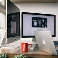 Macbook with Mac Computers on Office Desk