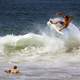 Two surfers riding waves in the ocean