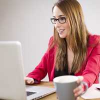 Woman working on a laptop on the office