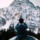 Photographer taking picture of a mountain in Banff National Park, Alberta, Canada