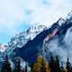 Fog on the high Mountains with trees in Jasper National Park, Alberta, Canada