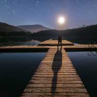 Standing on the docks looking at the moon and stars in British Columbia