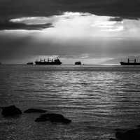 Light on the ocean with ships in Vancouver, British Columbia, Canada