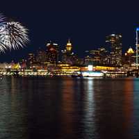 Skyline and fireworks at night in Vancouver, British Columbia, Canada