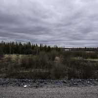 Heavy Clouds over the swampy landscape and forest near Dettah