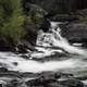 Looking across the cascading waters of Cameron Falls