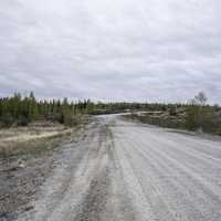 Paved road of the Ingraham trail under cloudy skies