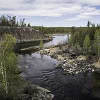 Upstream landscape on the Cameron River on the Ingraham Trail