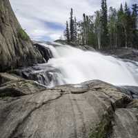 Water Falling from the top of Cameron Falls on the Ingraham Trail