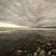 Lakeshore Landscape under Cloudy Dramatic Skies at dusk on Great Slave Lake