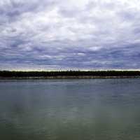 Landscape across the McKenzie River under the Clouds