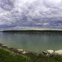 Panoramic of the Mackenzie river landscape under clouds