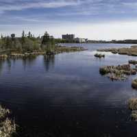 Buildings and landscape across Niven Lake in Yellowknife