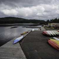 Canoes by the lakeshore at Algonquin Provincial Park, Ontario