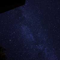 Galaxy and Stars above the Cabin and Trees at Algonquin Provincial Park, Ontario