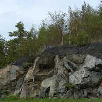 Blackened rocks in Sudbury in Ontario, Canada
