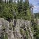 Man standing on the bluff at Ouimet Canyon Provincial Park, Ontario