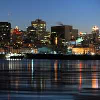 Night Time Skyline with towers and buildings over the water in Montreal, Quebec