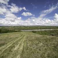 Hill and River under the Skies in Saskatchewan