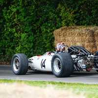 Racecar near a haystack