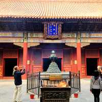 Worshipping at Lama Temple in Beijing, China