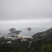 Town, Beach, ocean, and mountain landscape