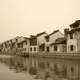 City near Qingming Bridge with houses and water in Wuxi, Jiangsu, China