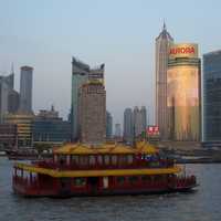 Skyline of Pudong, Shanghai, China behind a boat